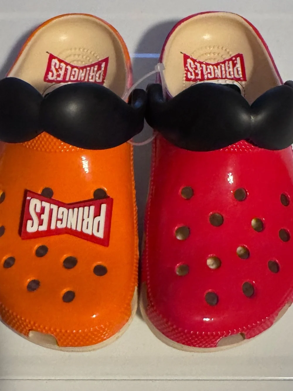 Pringles Crocs Orange and Red Sandals with Black Moustache
